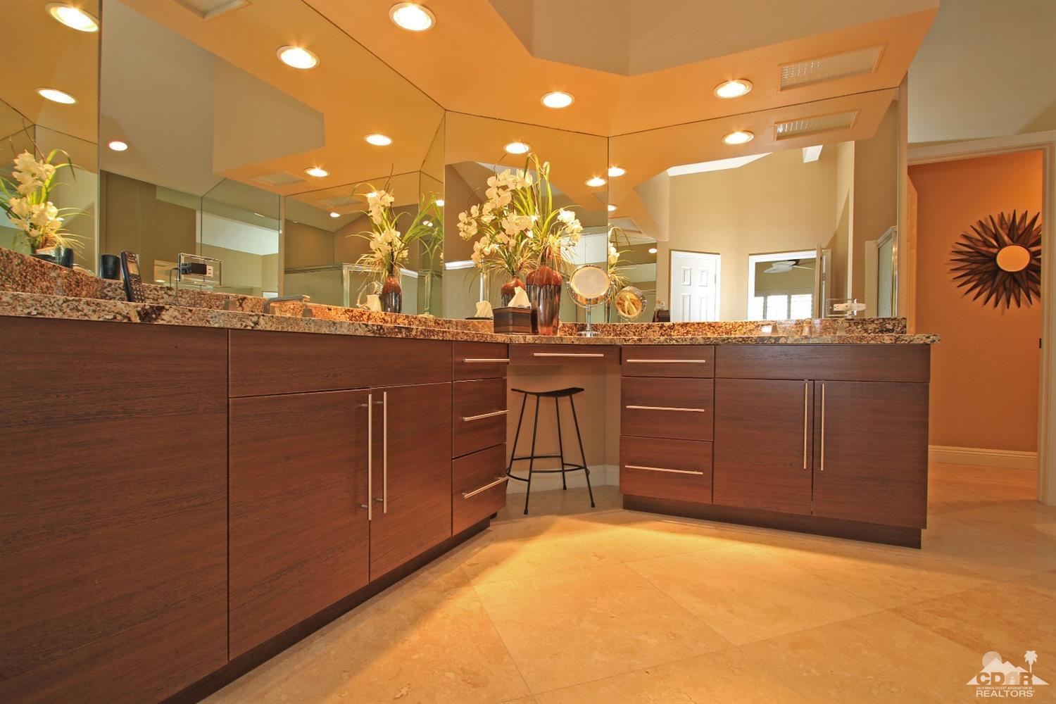326 Red River Road Palm Desert, CA 92211 - Photo 37 of 54 a large kitchen with lots of counter space and a sink