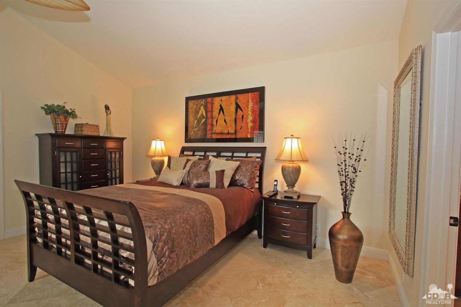326 Red River Road Palm Desert, CA 92211 - Photo 39 of 54 a bedroom with a bed and a chair