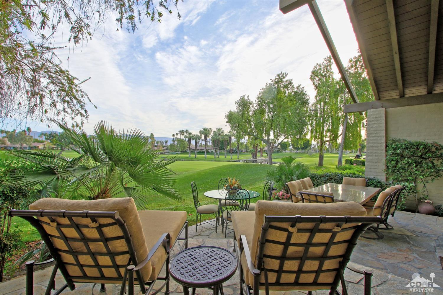326 Red River Road Palm Desert, CA 92211 - Photo 46 of 54 a view of a patio with garden and furniture