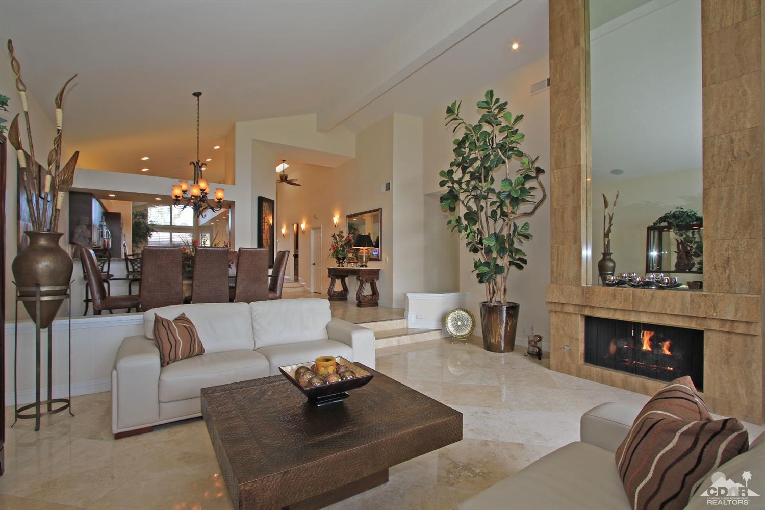 326 Red River Road Palm Desert, CA 92211 - Photo 9 of 54 a living room with furniture and a fireplace