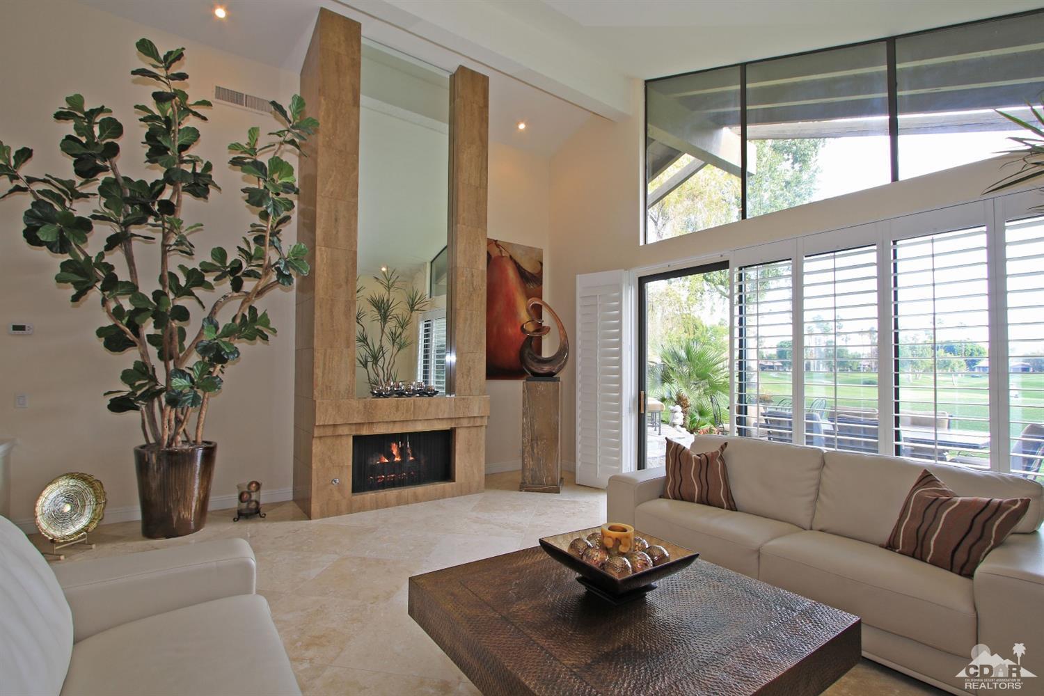 326 Red River Road Palm Desert, CA 92211 - Photo 10 of 54 a living room with furniture and a fireplace