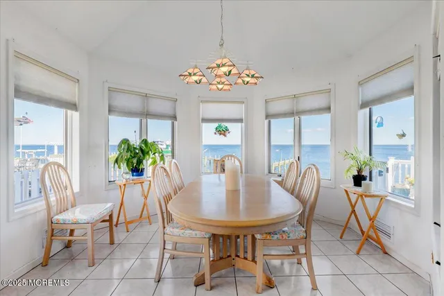 a bathroom with a sink a mirror a toilet and a sink