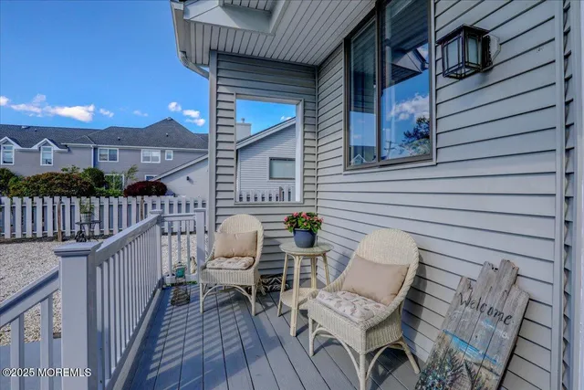 a view of entryway and hall with a rug