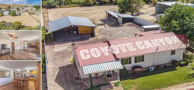 a view of a patio with a table and chairs
