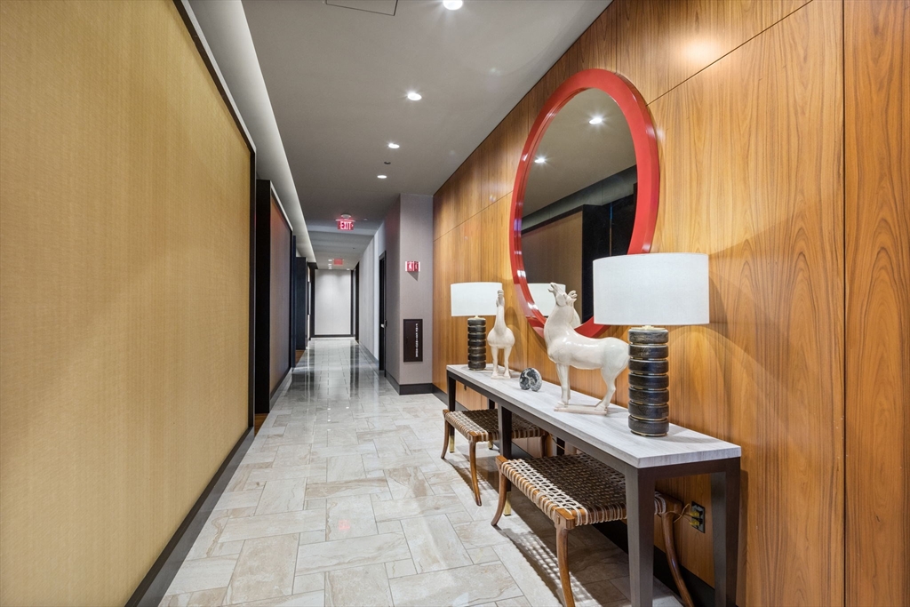 1 Franklin Street, Unit 3808 Boston, MA 02110 - Photo 33 of 40 a view of hallway with furniture