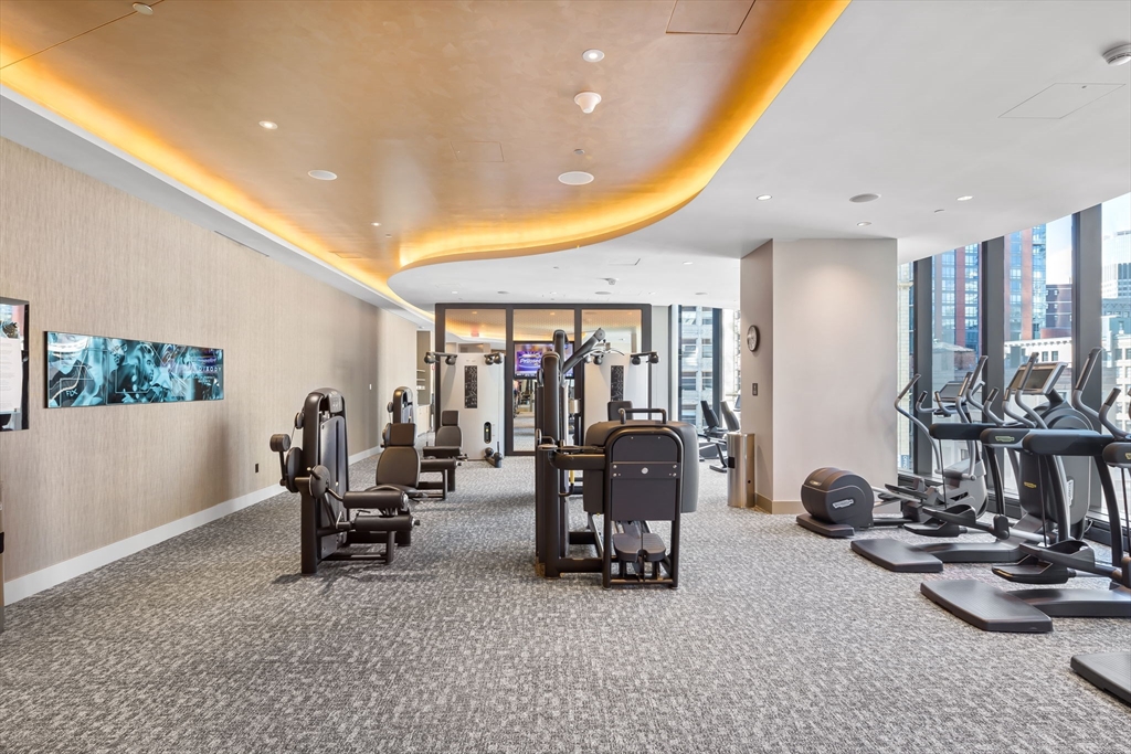 1 Franklin Street, Unit 3808 Boston, MA 02110 - Photo 34 of 40 a view of a room with gym equipment