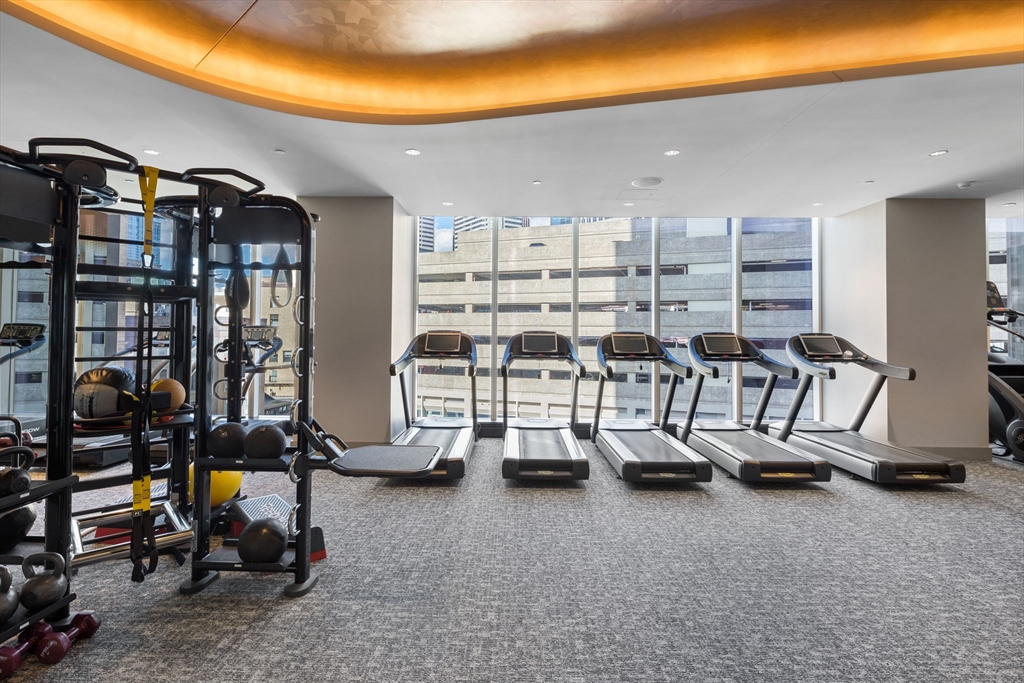 1 Franklin Street, Unit 3808 Boston, MA 02110 - Photo 37 of 40 a view of a room with gym equipment
