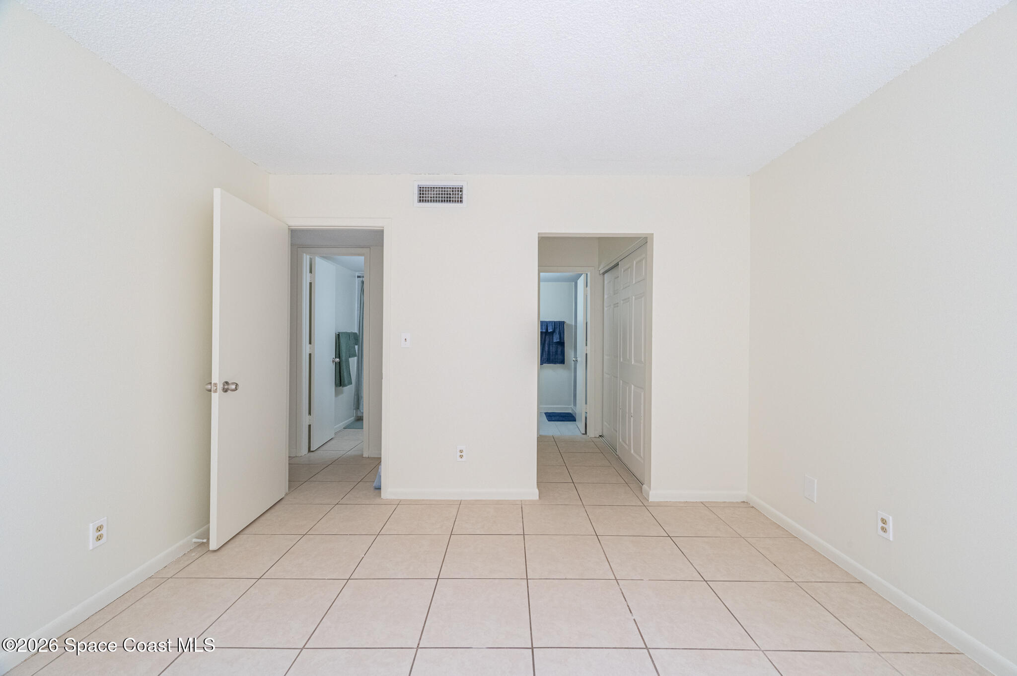 1641 Sunny Brook Lane, Unit C104 Palm Bay, FL 32905 - Photo 17 of 37 Primary Bedroom