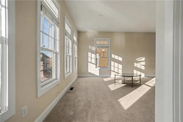 a view of a hallway with a couch