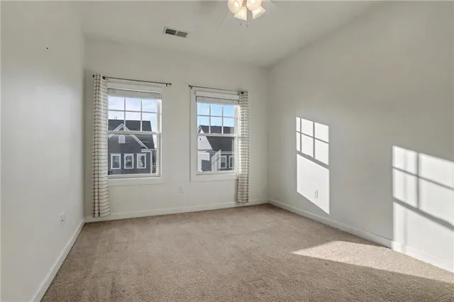 an empty room with windows