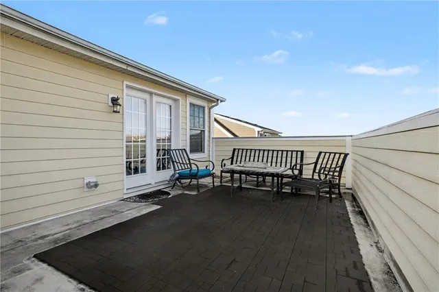 a balcony with a bench