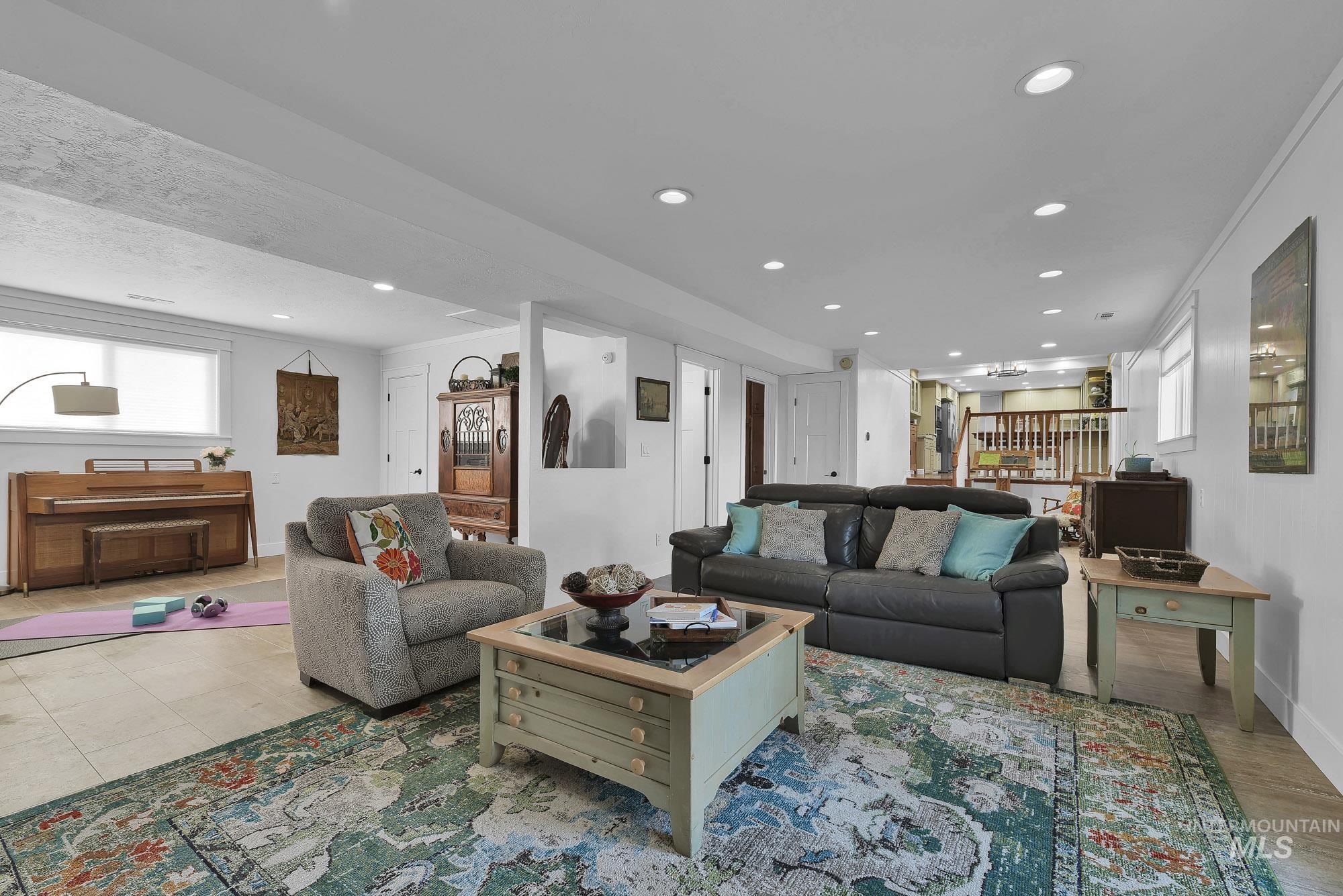 315 East Pat Lane Caldwell, ID 83607 - Photo 22 of 50 Family room Living area with recessed lighting - open to the sitting area - half bath - and work out area