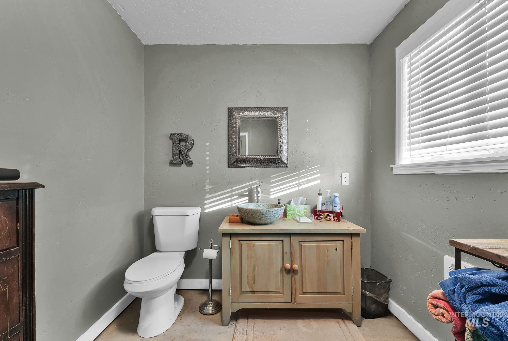 315 East Pat Lane Caldwell, ID 83607 - Photo 45 of 50 Bathroom featuring vanity and Toilet for Swimming Pool