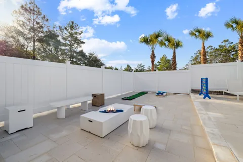 a dining room with furniture window and wooden floor