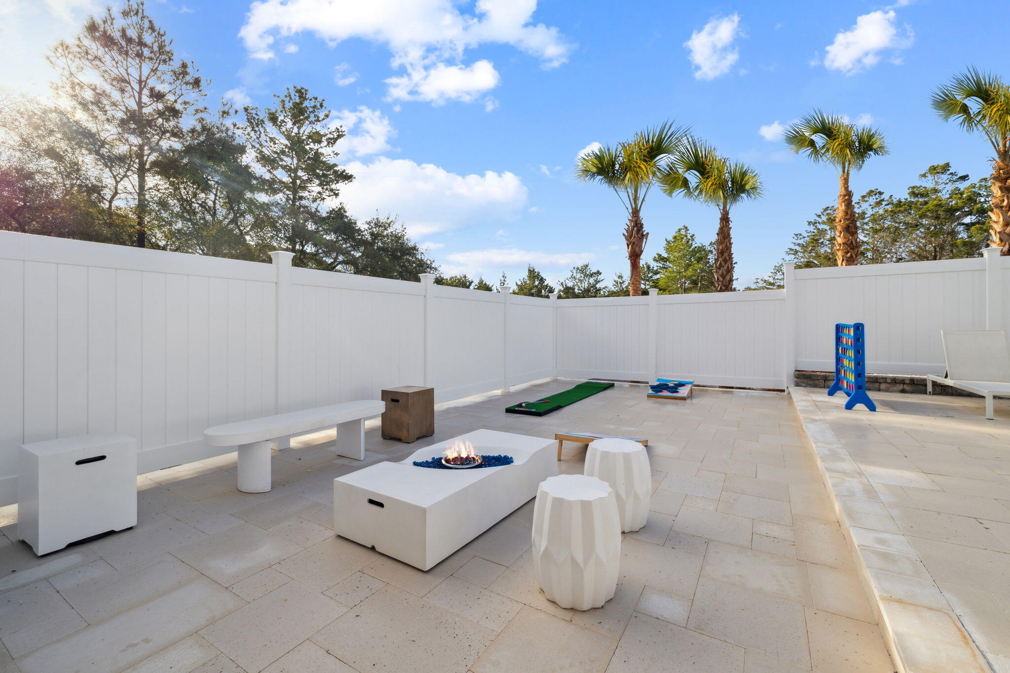 204 Sandstone Street Santa Rosa Beach, FL 32459 - Photo 20 of 80 a view of terrace with lawn chairs and potted plants