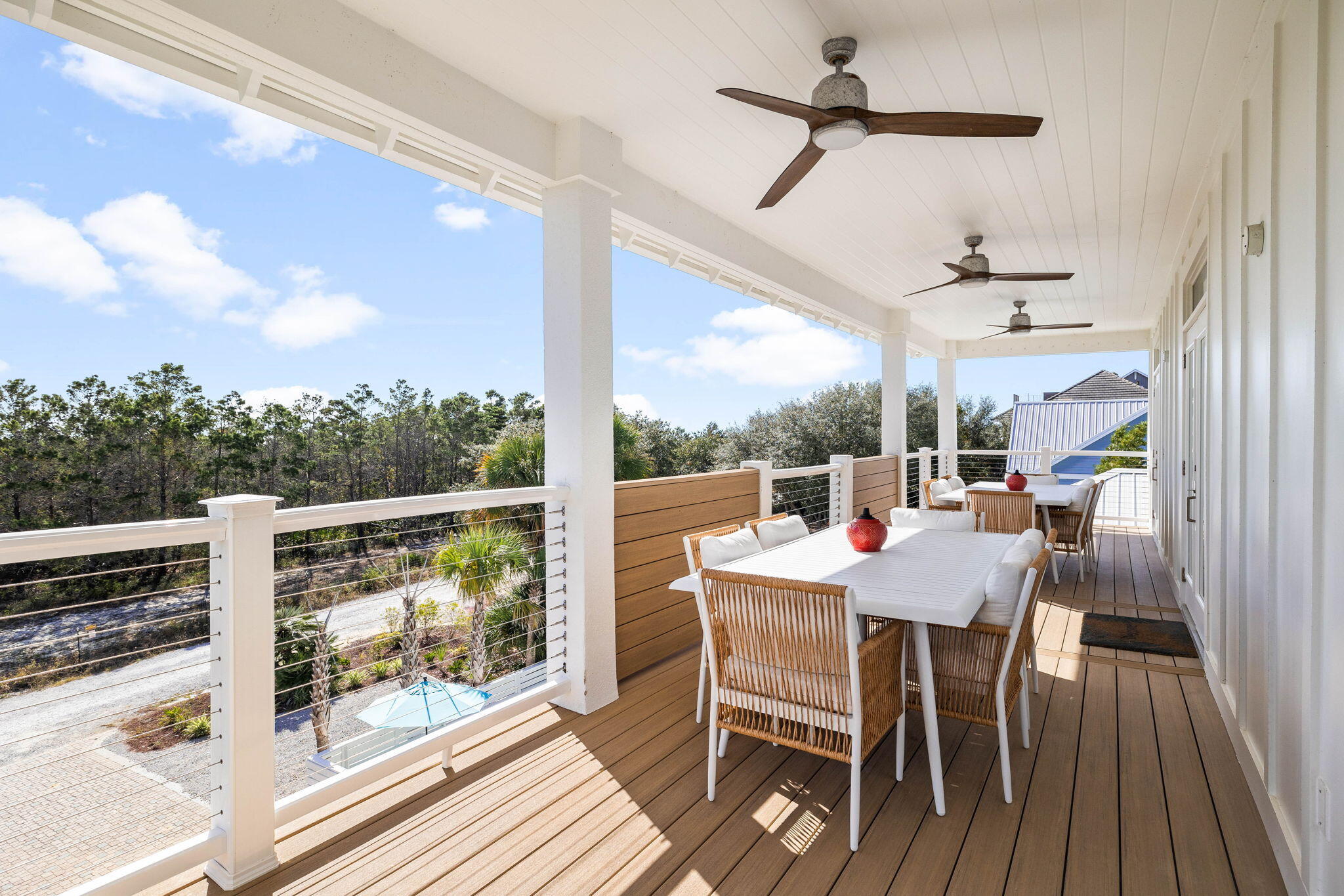204 Sandstone Street Santa Rosa Beach, FL 32459 - Photo 34 of 80 a dining room with furniture window and wooden floor