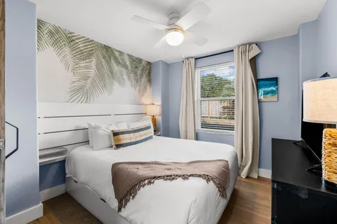 a view of a patio with dining table and chairs