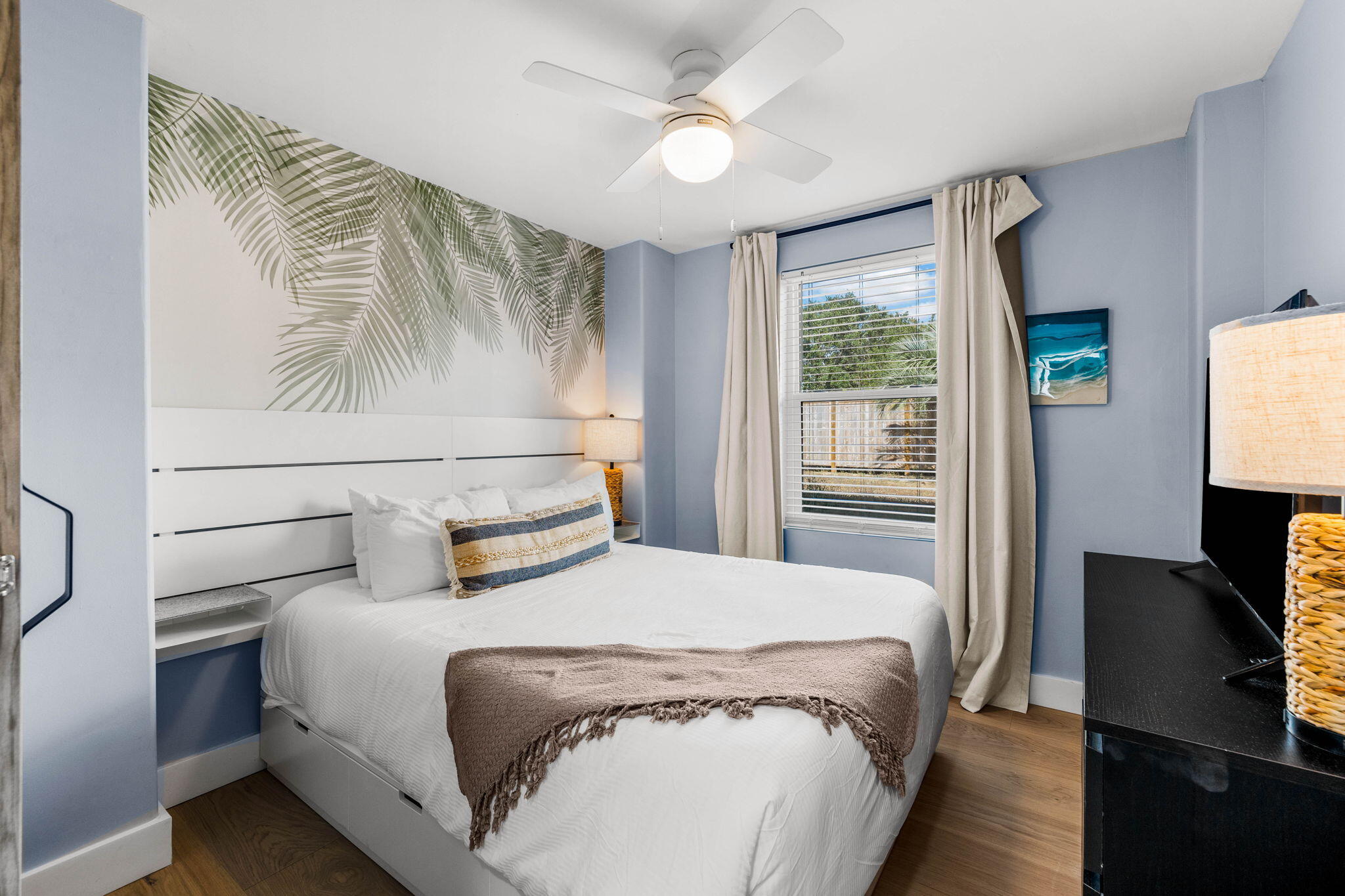 204 Sandstone Street Santa Rosa Beach, FL 32459 - Photo 45 of 80 a bedroom with a bed tv and a window