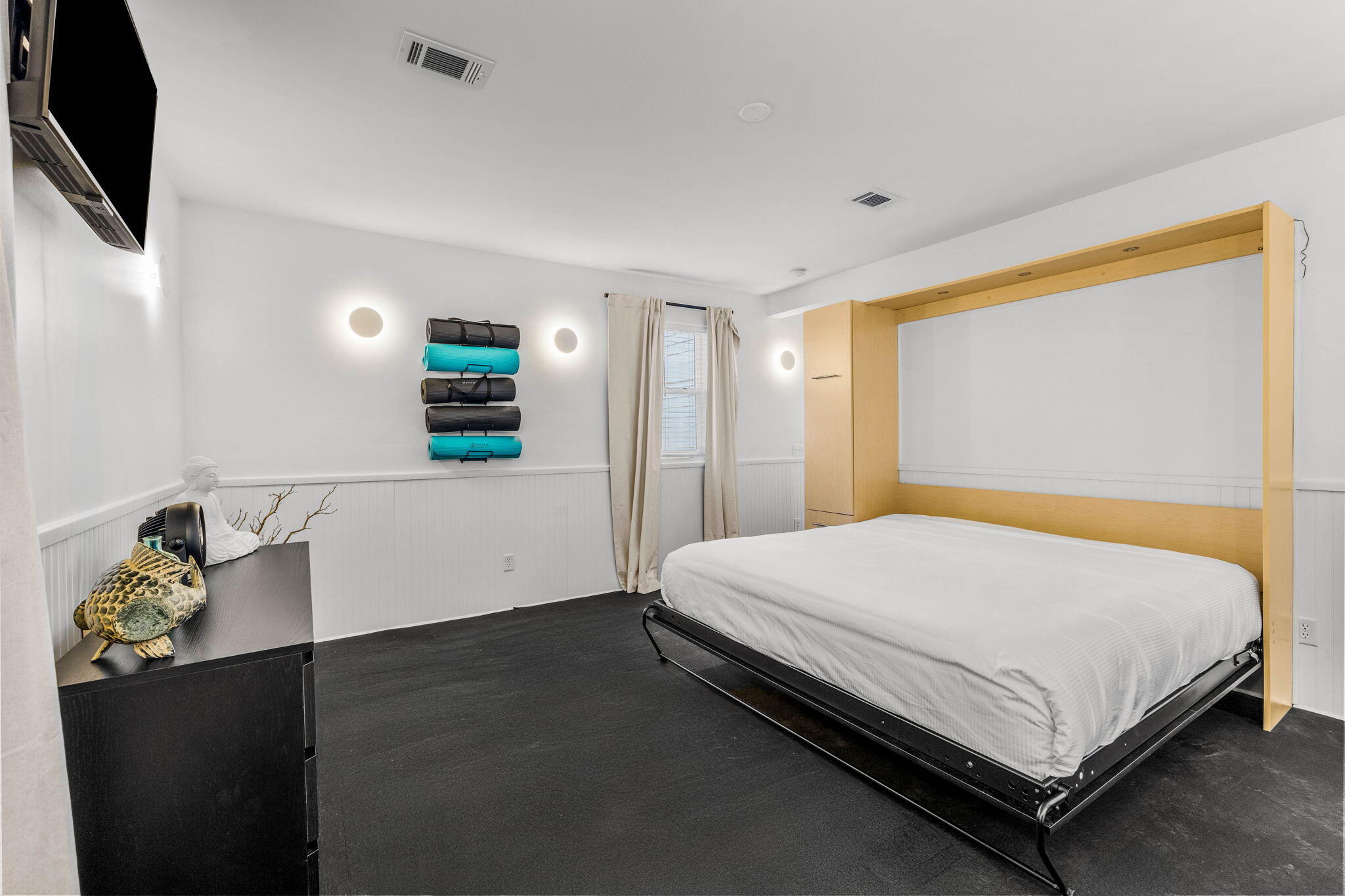 204 Sandstone Street Santa Rosa Beach, FL 32459 - Photo 48 of 80 a bed sitting in a spacious bedroom next to a window