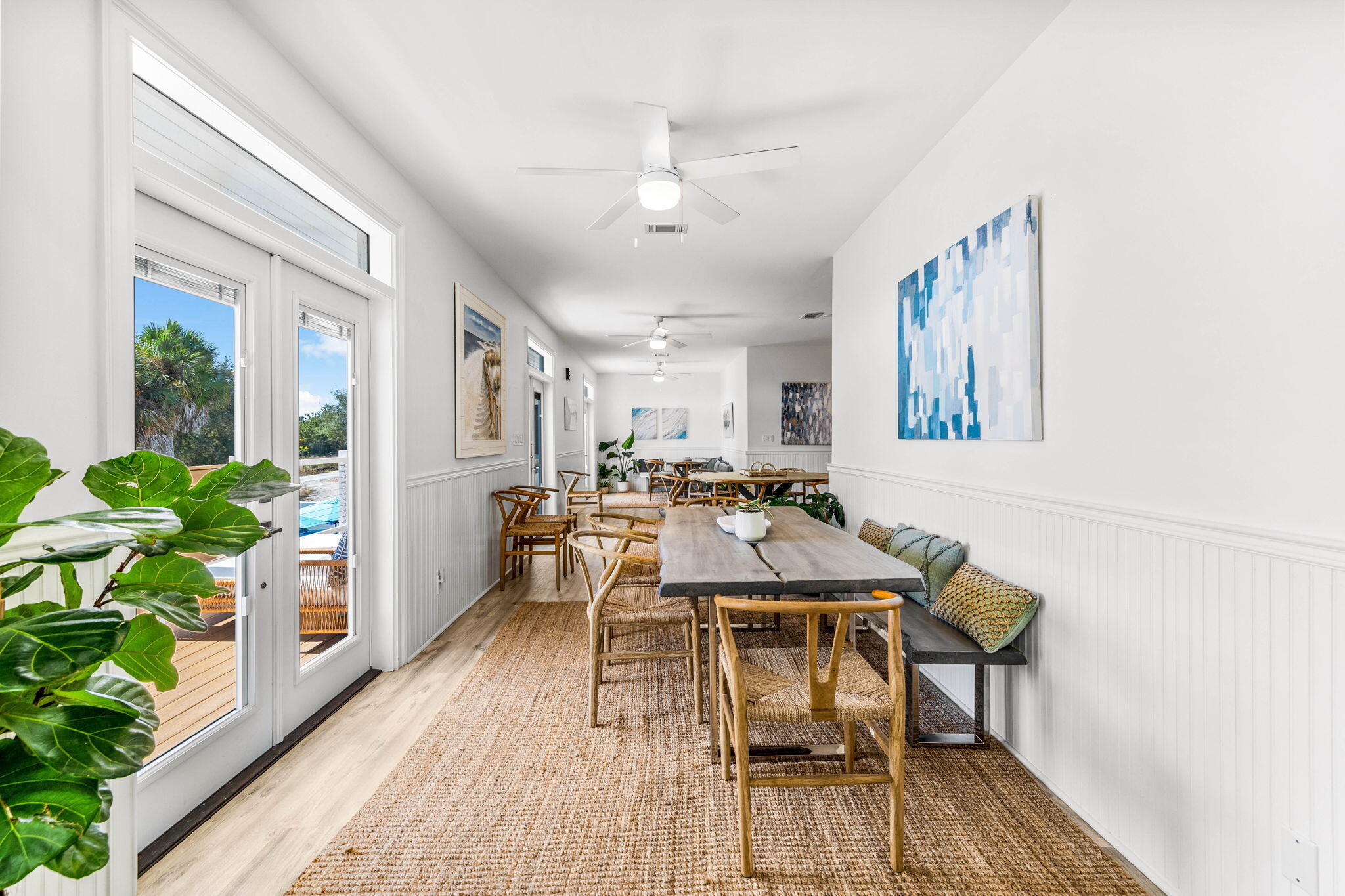 204 Sandstone Street Santa Rosa Beach, FL 32459 - Photo 55 of 80 a view of a dining room with furniture window and wooden floor