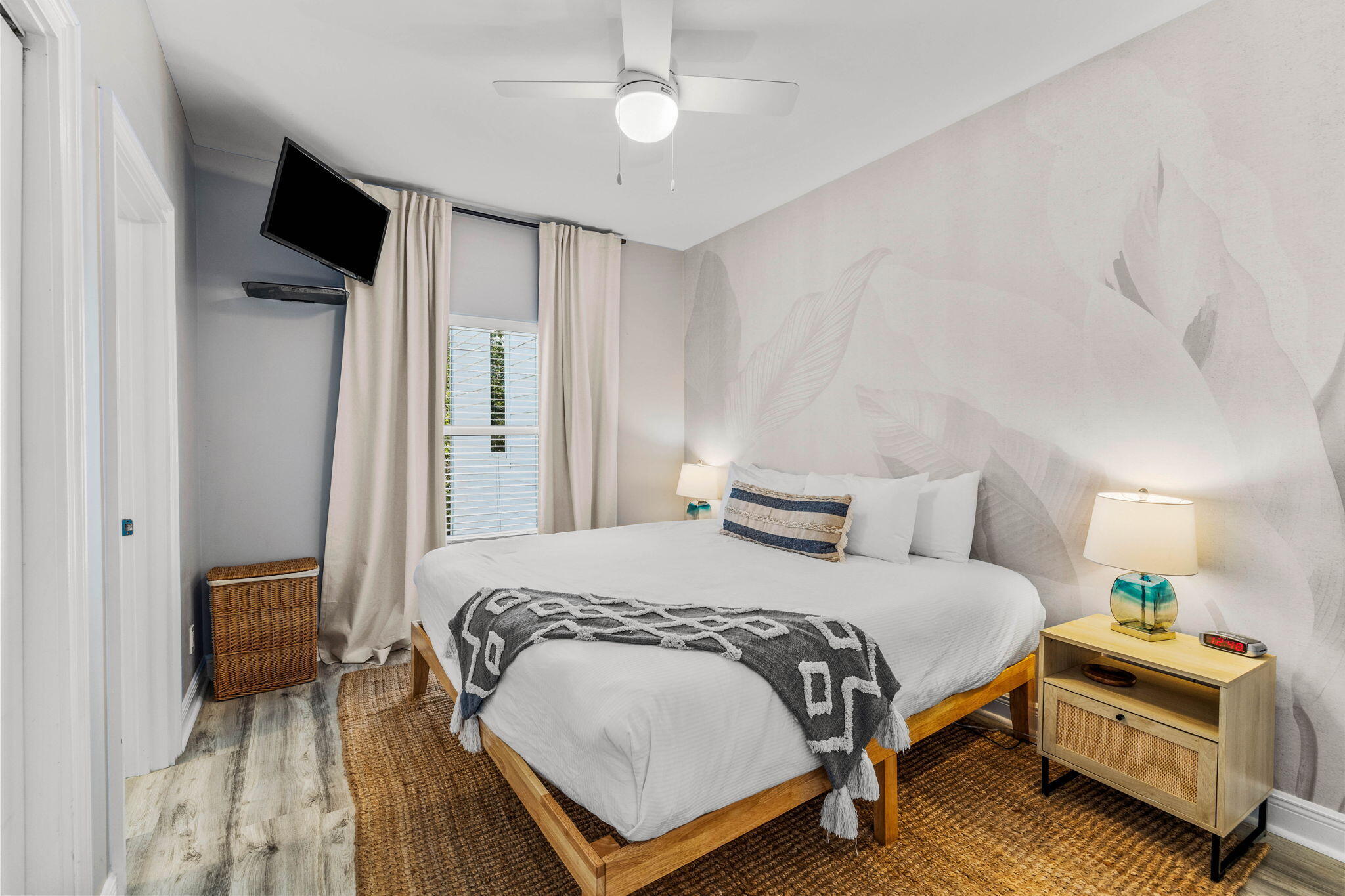 204 Sandstone Street Santa Rosa Beach, FL 32459 - Photo 62 of 80 a bedroom with a bed and a chandelier