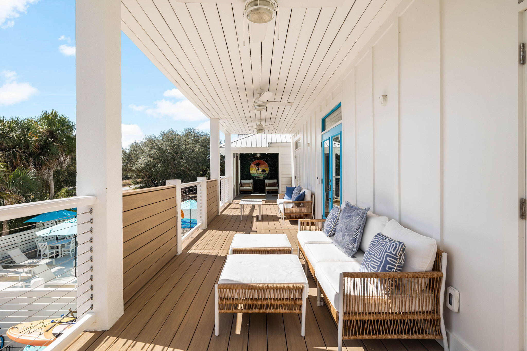 204 Sandstone Street Santa Rosa Beach, FL 32459 - Photo 68 of 80 a view of a patio with dining table and chairs