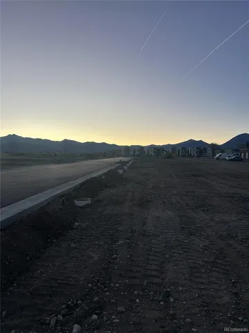 a view of a house with a mountain