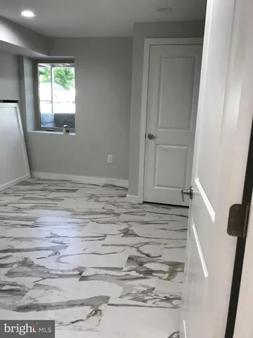 a view of wooden floor and staircase