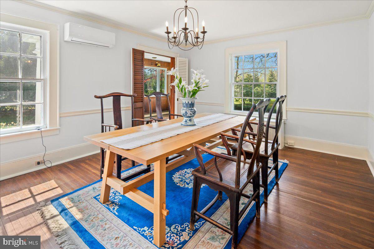 700 River Road Ewing, NJ 08628 - Photo 4 of 71 a view of a dining room with furniture window and wooden floor