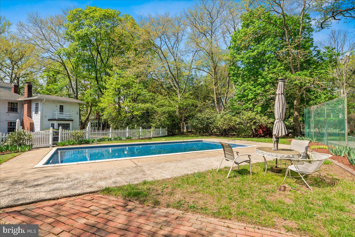 700 River Road Ewing, NJ 08628 - Photo 41 of 71 a view of swimming pool with a patio
