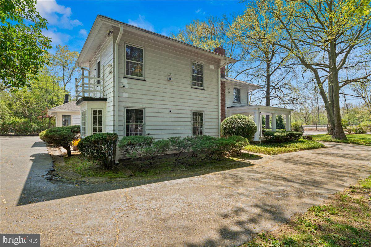 700 River Road Ewing, NJ 08628 - Photo 44 of 71 a view of a house with a yard and large tree
