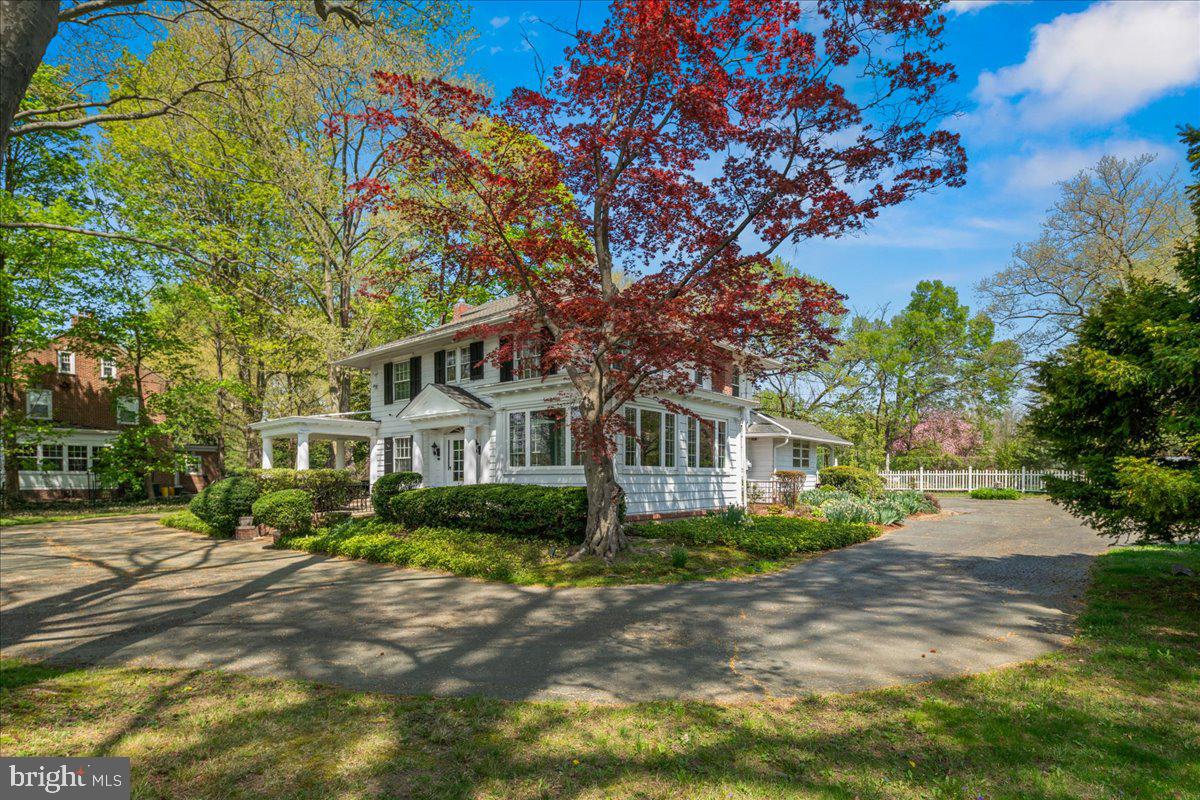 700 River Road Ewing, NJ 08628 - Photo 50 of 71 a front view of a house with a garden