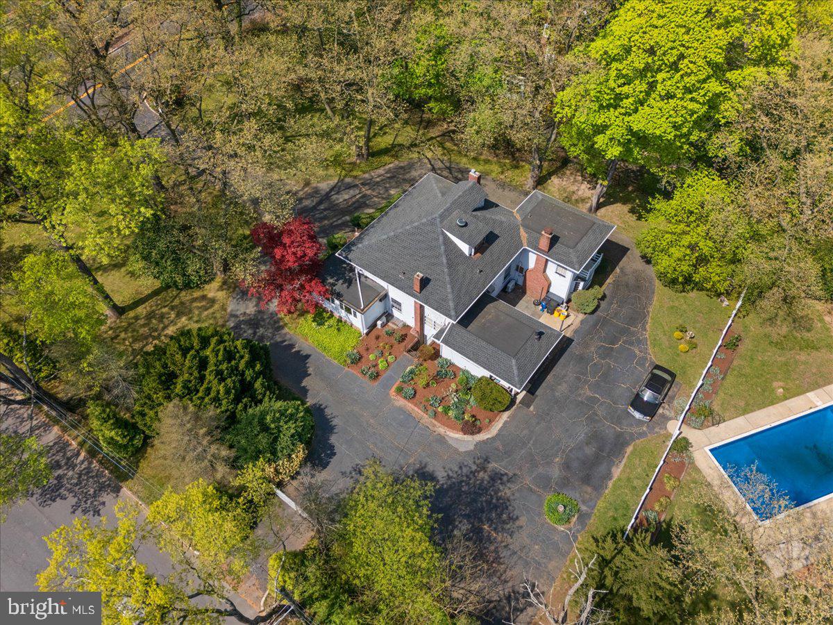 700 River Road Ewing, NJ 08628 - Photo 59 of 71 an aerial view of a house with a yard and trees