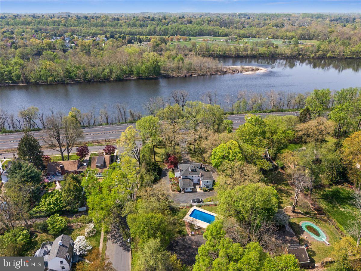700 River Road Ewing, NJ 08628 - Photo 63 of 71 an aerial view of a house with a lake view