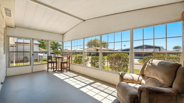 a view of a livingroom with a large window