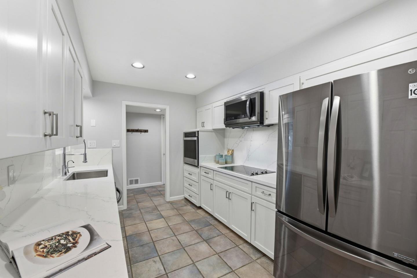 1663 Curtner Avenue San Jose, CA 95125 - Photo 10 of 57 a kitchen with stainless steel appliances a refrigerator sink and microwave