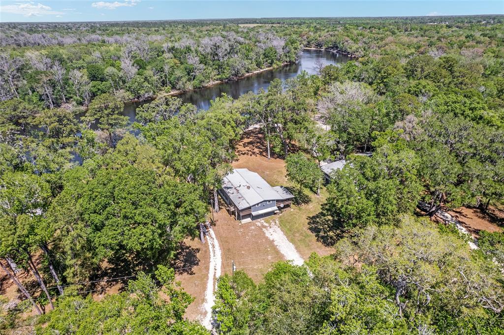 7870 Southwest 25th Place Bell, FL 32619 - Photo 17 of 93 an aerial view of residential house with outdoor space