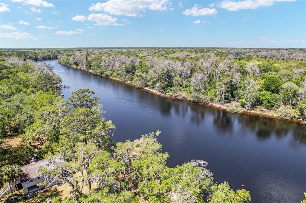 7870 Southwest 25th Place Bell, FL 32619 - Photo 22 of 93 a view of a lake with a mountain