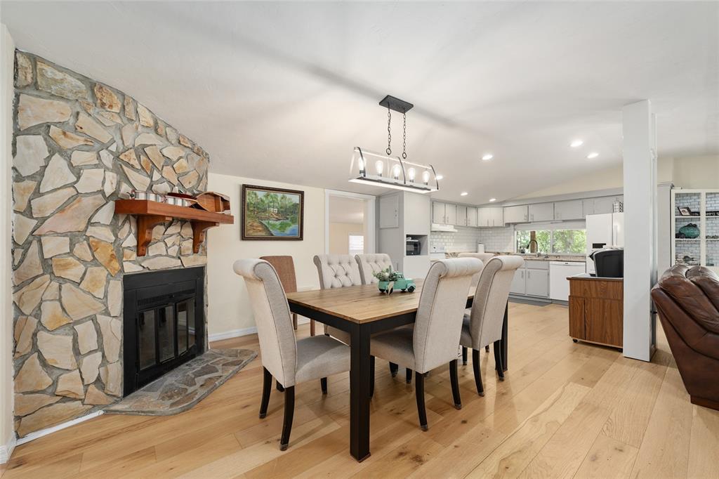 7870 Southwest 25th Place Bell, FL 32619 - Photo 3 of 93 a view of a dining room with furniture and chandelier