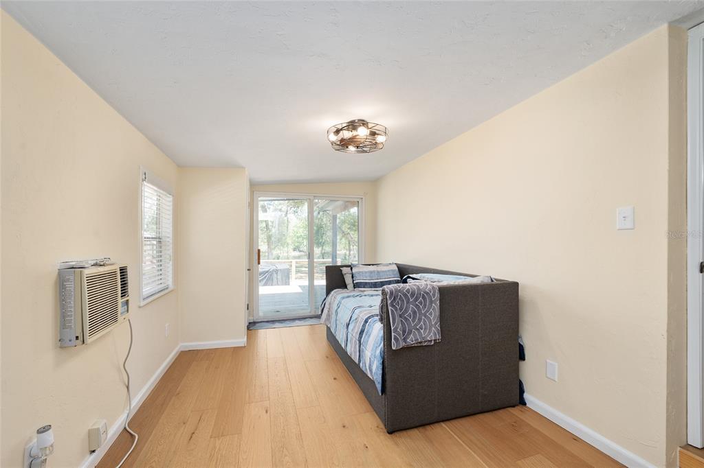 7870 Southwest 25th Place Bell, FL 32619 - Photo 74 of 93 a living room with furniture and large window