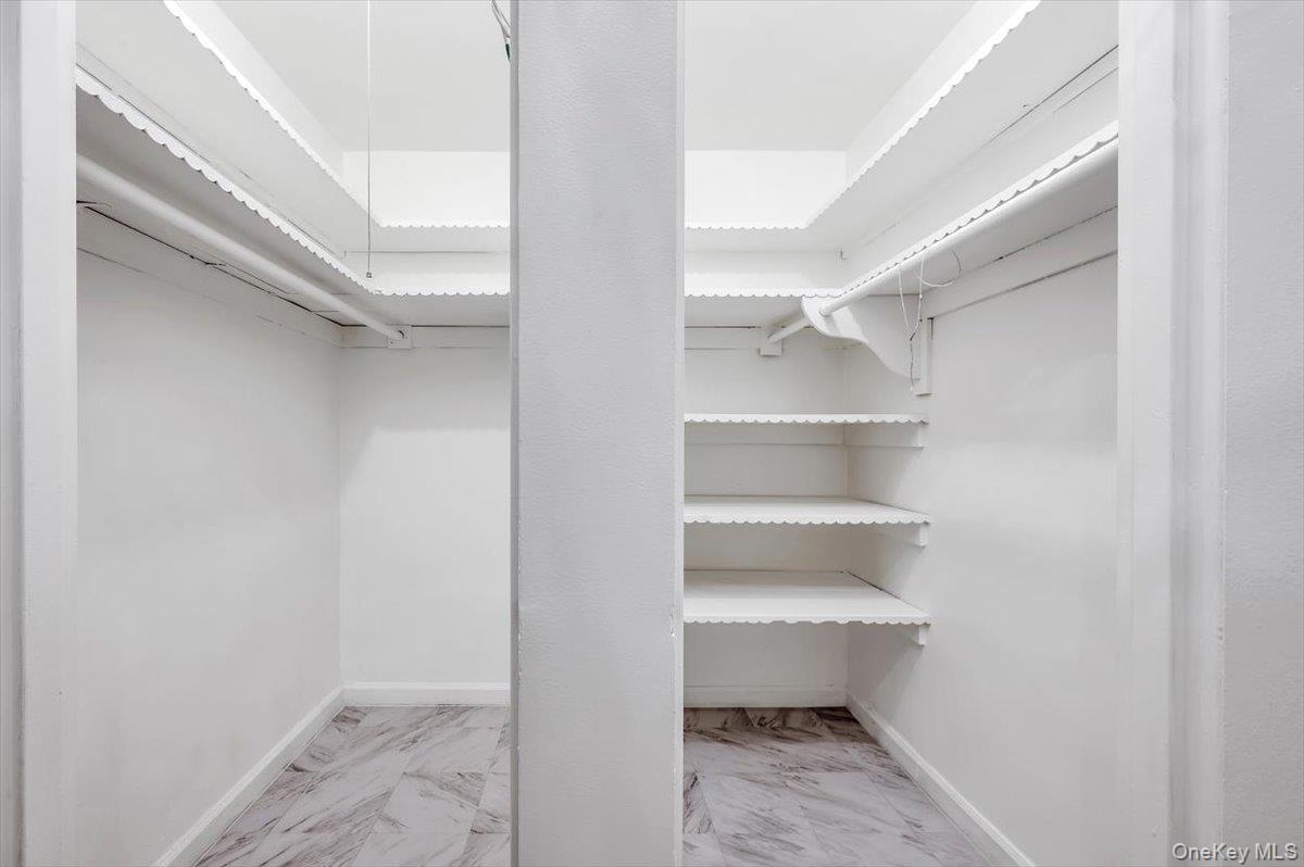 301 East 48th Street, Unit 2C Manhattan, NY 10017 - Photo 14 of 22 a view of an empty walk in closet