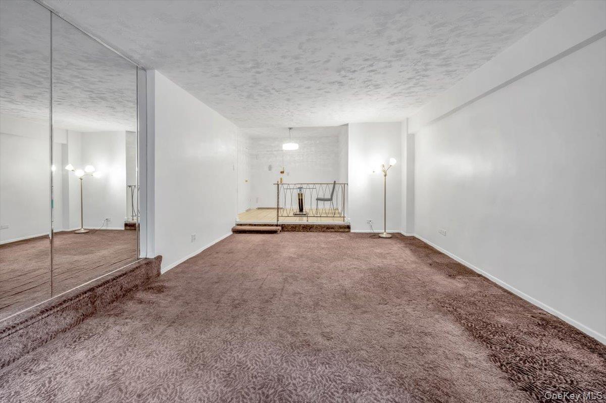 301 East 48th Street, Unit 2C Manhattan, NY 10017 - Photo 3 of 22 a view of a hallway