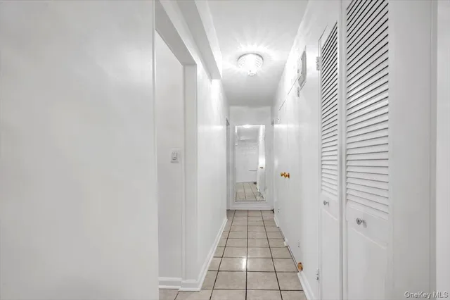 a view of a bathroom from a hallway