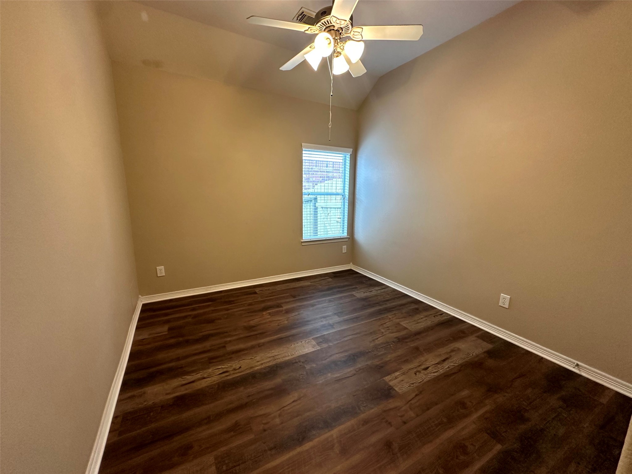 2047 Lulach Lane Conroe, TX 77301 - Photo 12 of 20 wooden floor in an empty room