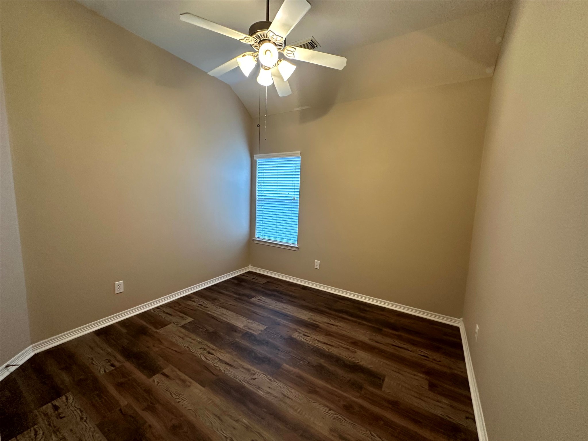 2047 Lulach Lane Conroe, TX 77301 - Photo 14 of 20 a view of room with window and ceiling fan