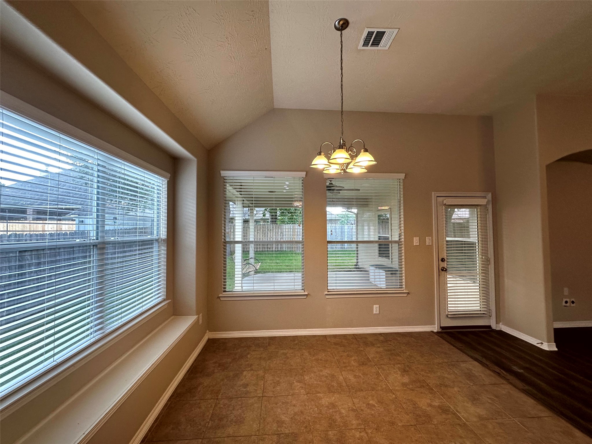 2047 Lulach Lane Conroe, TX 77301 - Photo 8 of 20 a view of an empty room with a window