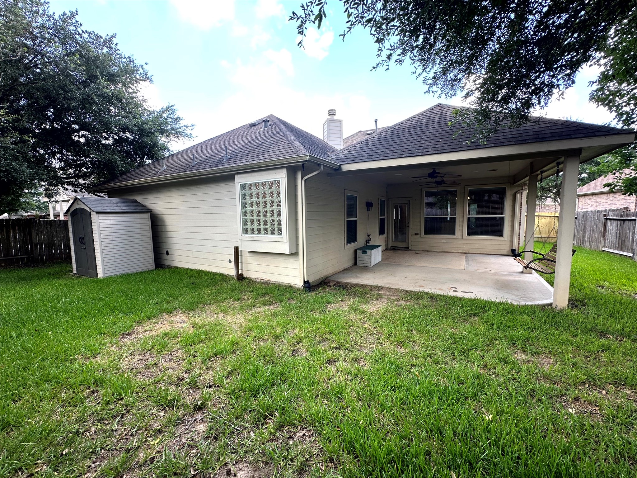 2047 Lulach Lane Conroe, TX 77301 - Photo 10 of 20 a view of a house with backyard and porch