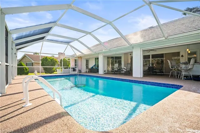 a view of a house with swimming pool