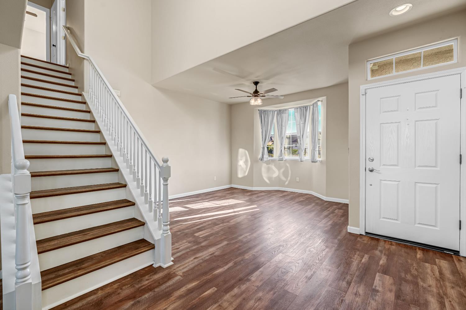 5629 North Citrus Lane Fresno, CA 93711 - Photo 6 of 35 wooden floor in an empty room with a window