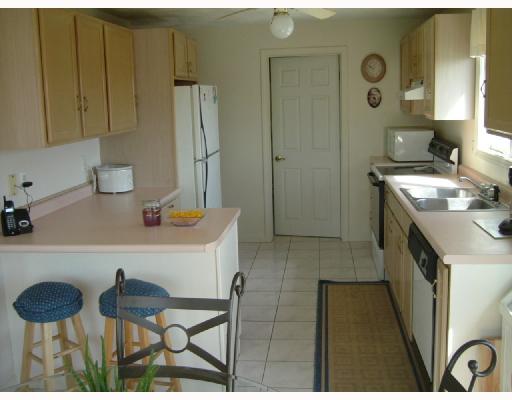 49 Foster Street Warwick, RI 02889 - Photo 3 of 8 Kitchen. Open kitchen with views of the salt water & flows nicely into dining area.